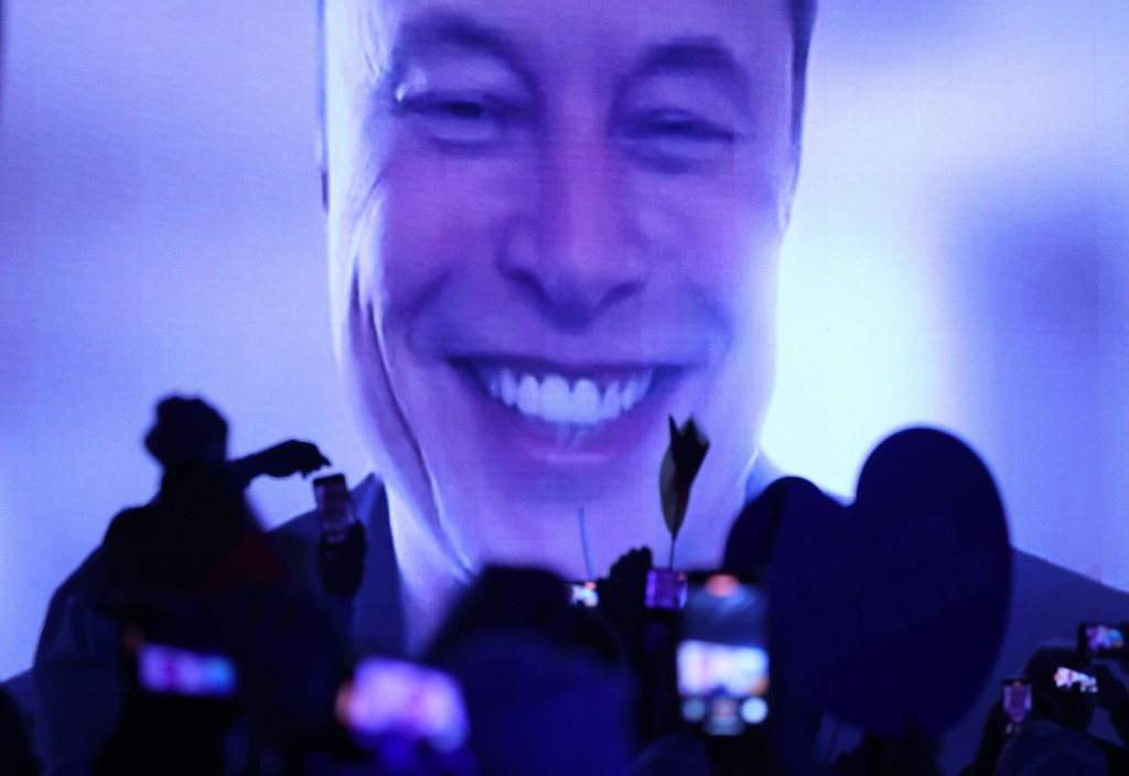 Tech billionaire Elon Musk speaks live via a video transmission during the election campaign launch rally of the far-right Alternative for Germany (AfD) political party on January 25, 2025 in Halle, Germany