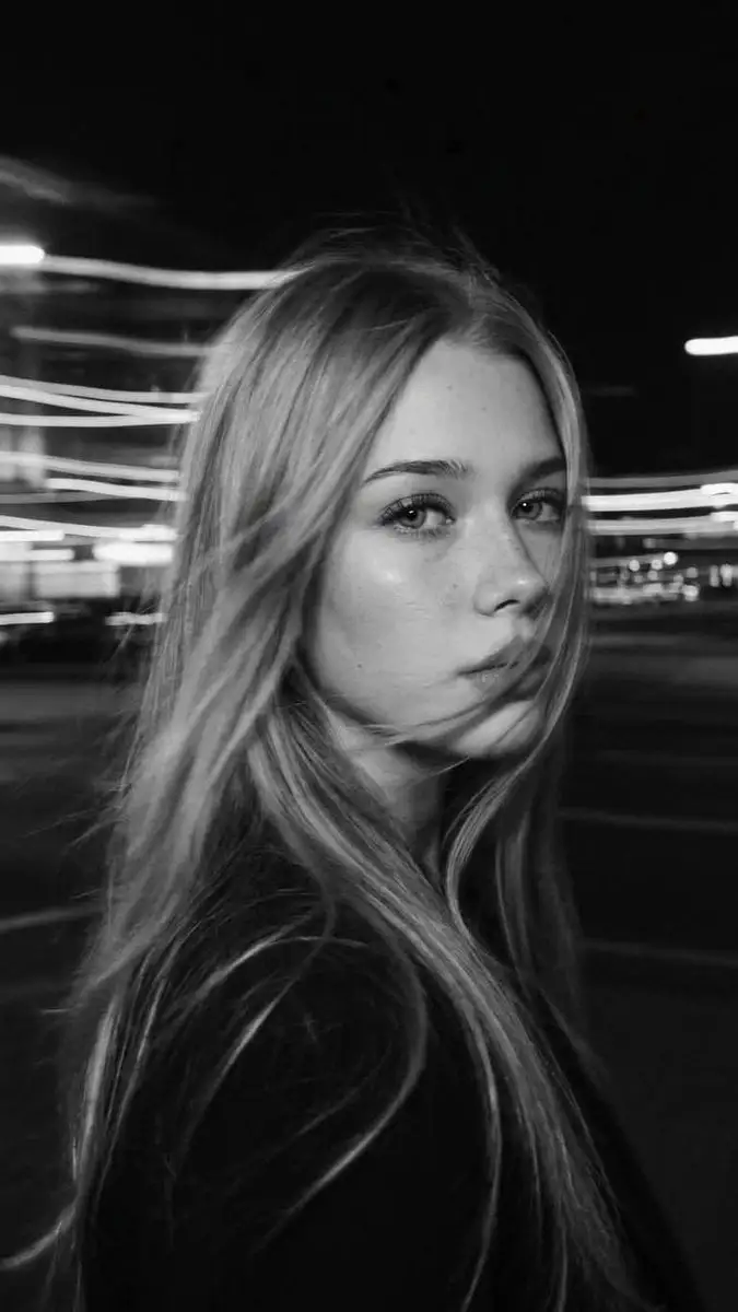 Ultra-realistic black-and-white cinematic street portrait...